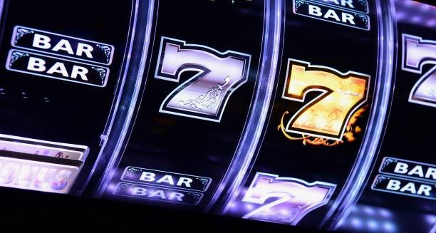 deimos mobile app home screen showing slot tournaments and live-dealer tables